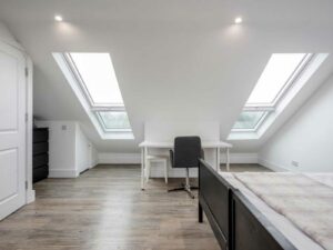 Loft conversion and rear extensions at Eastbourne Gardens, SW14 7NH