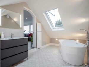 Loft conversion and rear extensions at Eastbourne Gardens, SW14 7NH